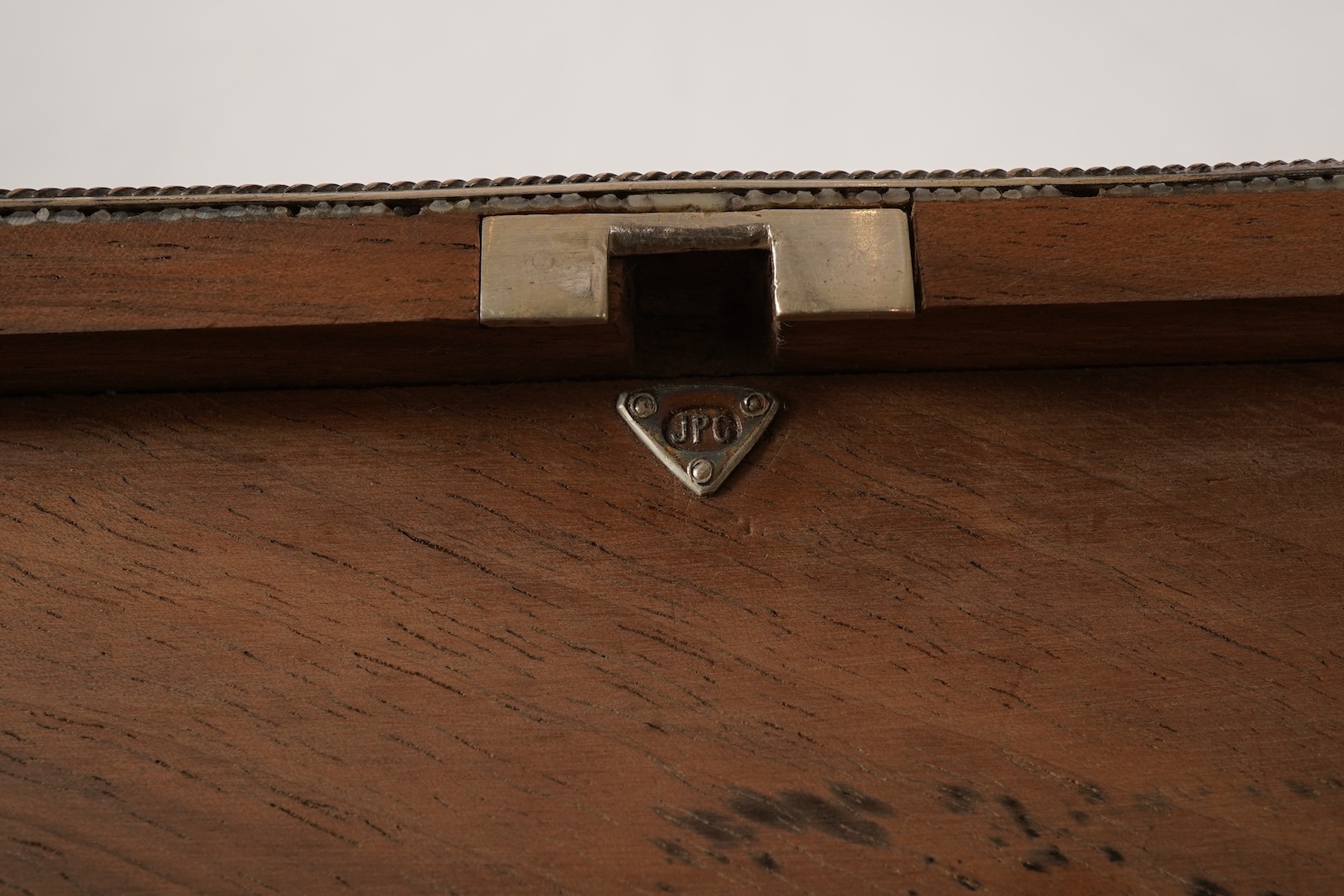 An early 20th century Arts & Crafts silver and shagreen mounted cigarette box with hinged cover, by John Paul Cooper